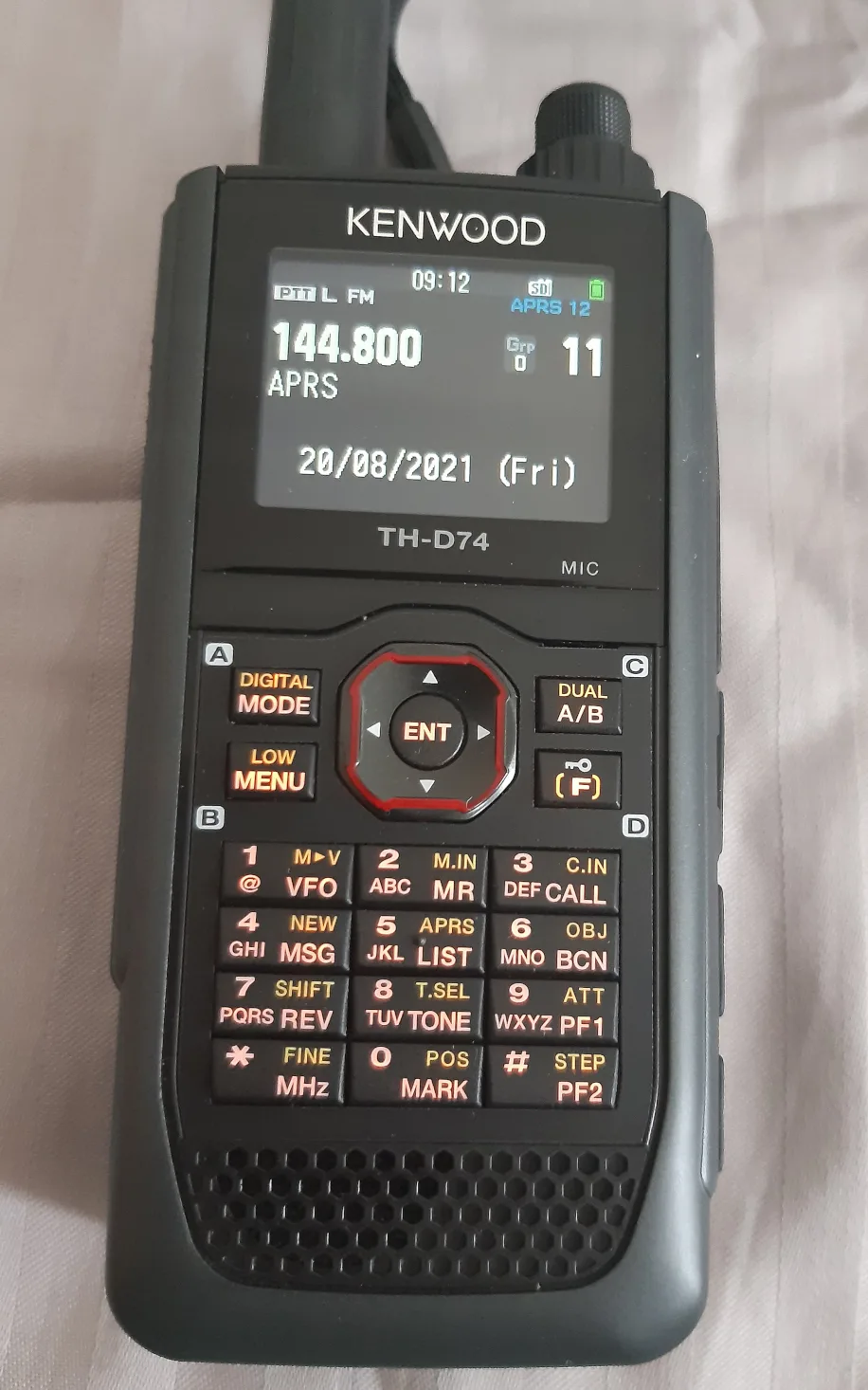 Kenwood TH-D74 showing APRS position data, an example of the receive and logging context for balloon tracking
