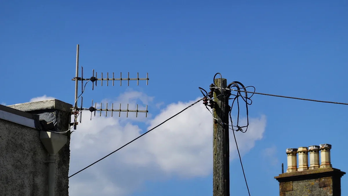 Antenna on a rooftop against a blue sky