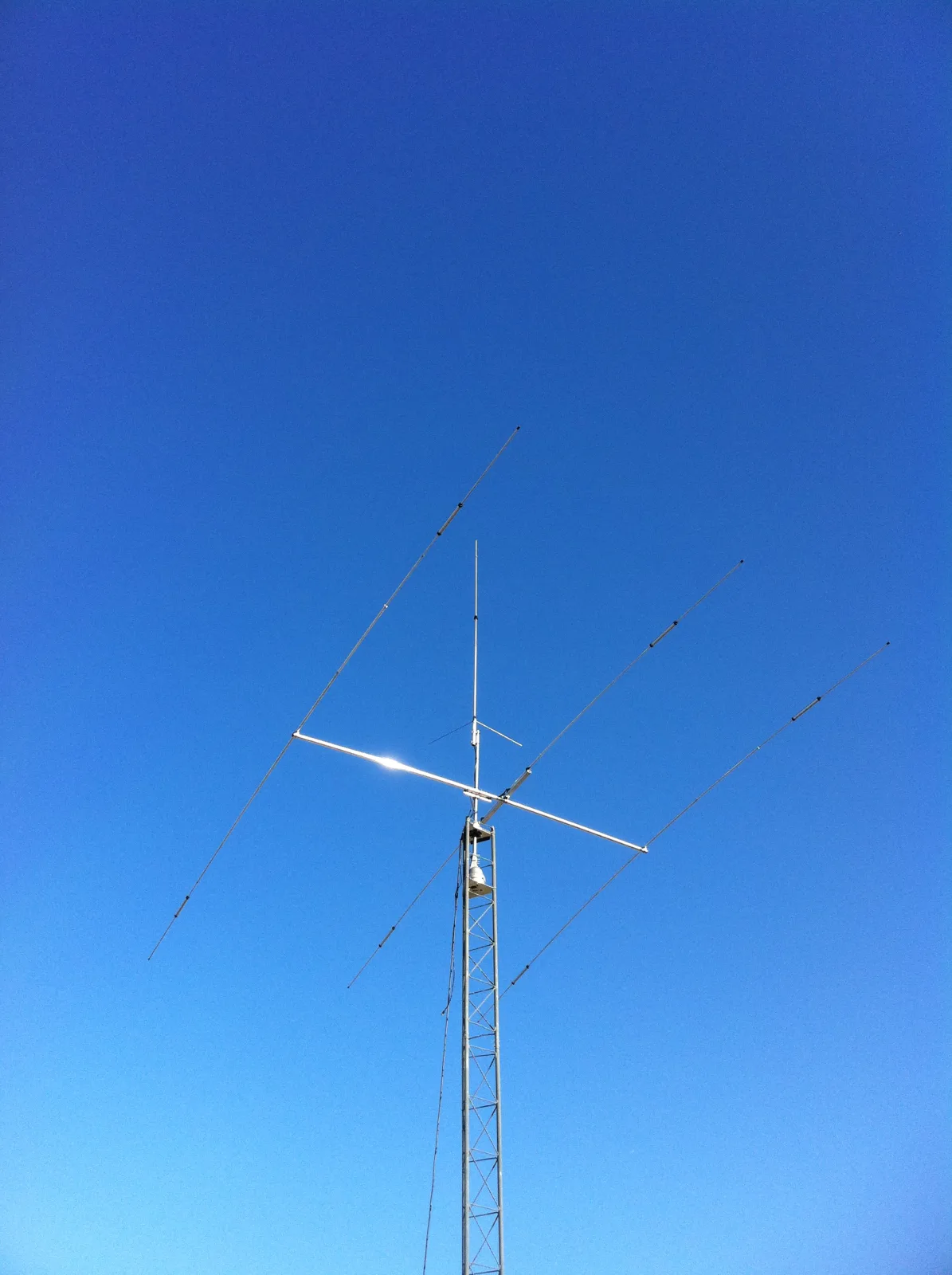 Ham radio antenna array against the sky